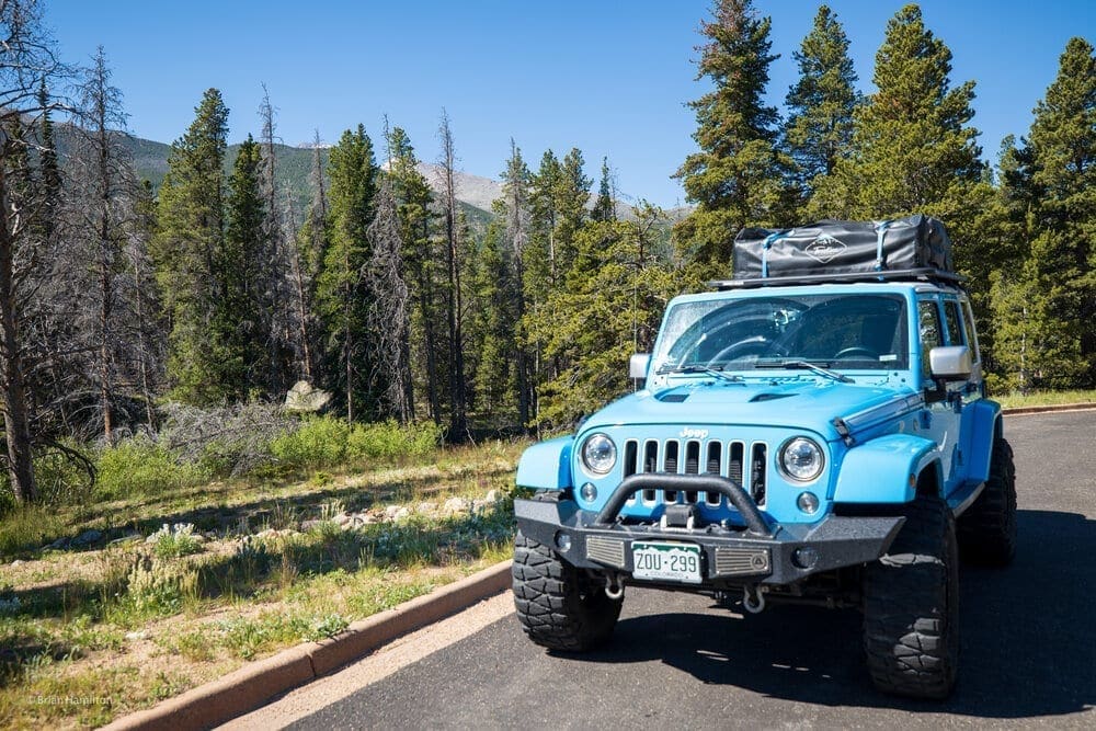 Skyblue Overland is set up for overlanding with a rooftop tent and related camping gear in Rocky Mountain National Park, Colorado.