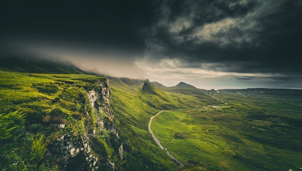 Dramatic Rainy Clouds over Scottish Highlands in the Isle of Skye.