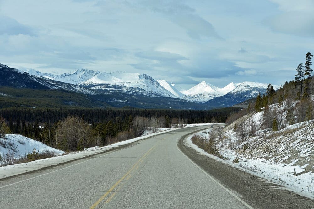The Alaska-Canadian Highway (ALCAN Highway) is 1,387 mi (2,232 km) long of remote wilderness.