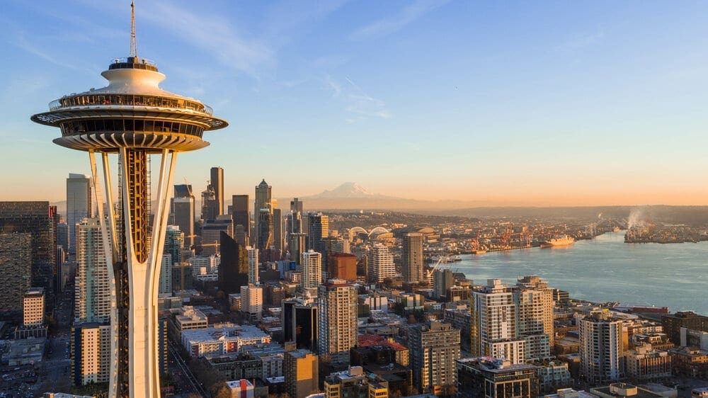 Seattle, Washington is known for its rainy climate as well as its close proximity to the Puget Sound, Cascade Mountains and for being the birthplace of Starbucks Coffee.