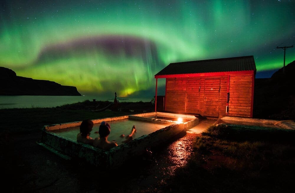 While daylight hours are limited, with only three to six hours of hiking time per day, there’s plenty of time for exploration with evenings spent basking under the hue of the northern lights and bathing in natural hot springs.