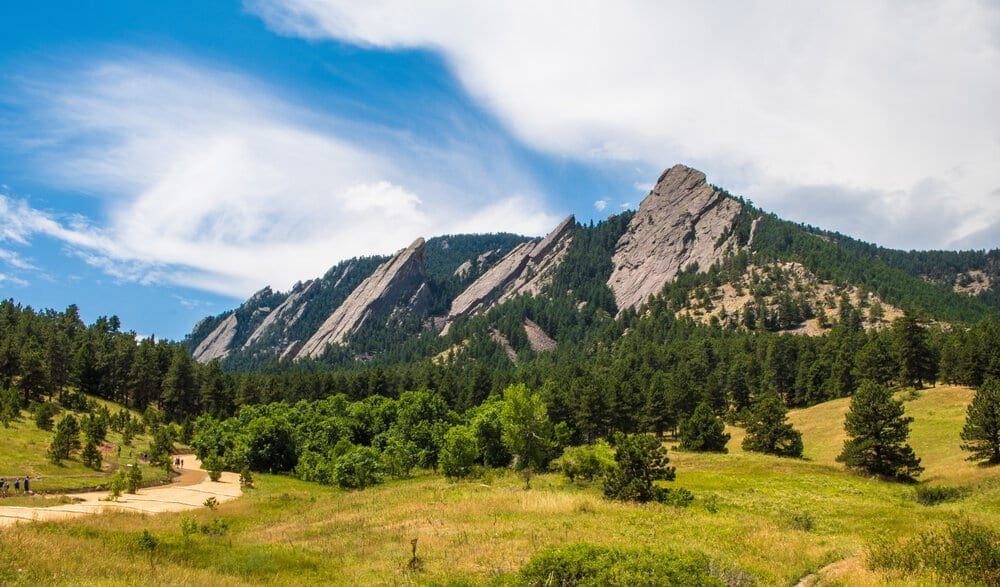 Rock Climbing the Flatirons - Over 900 routes and climbs that elevate in excess of 1,400 feet, there are plenty of options for climbers of all skill levels. The beautiful scenery of the Flatirons is a plus as well. 