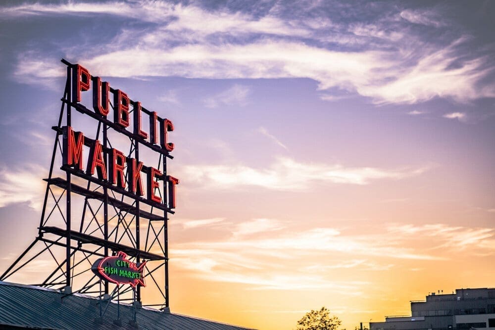 Overlooking the Elliott Bay waterfront on Puget Sound, Seattle’s Pike Place Market serves as a place of business for many small farmers, craftspeople and merchants.