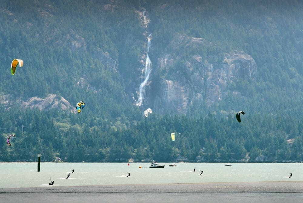 Kiteboarders and windsurfers have almost guaranteed wind off Squamish Spit where the Squamish River empties into the head of Howe Sound, British Columbia.