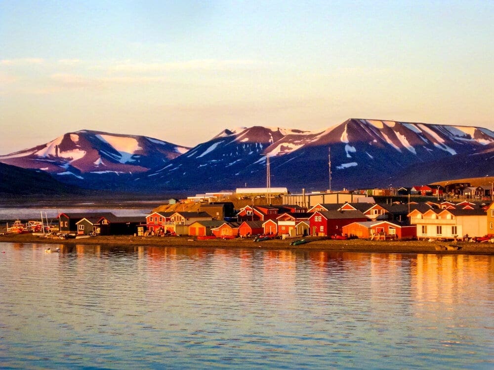 Midnight sun on the Longyearbyen waterfront in Svalbard in the Norwegian arctic.