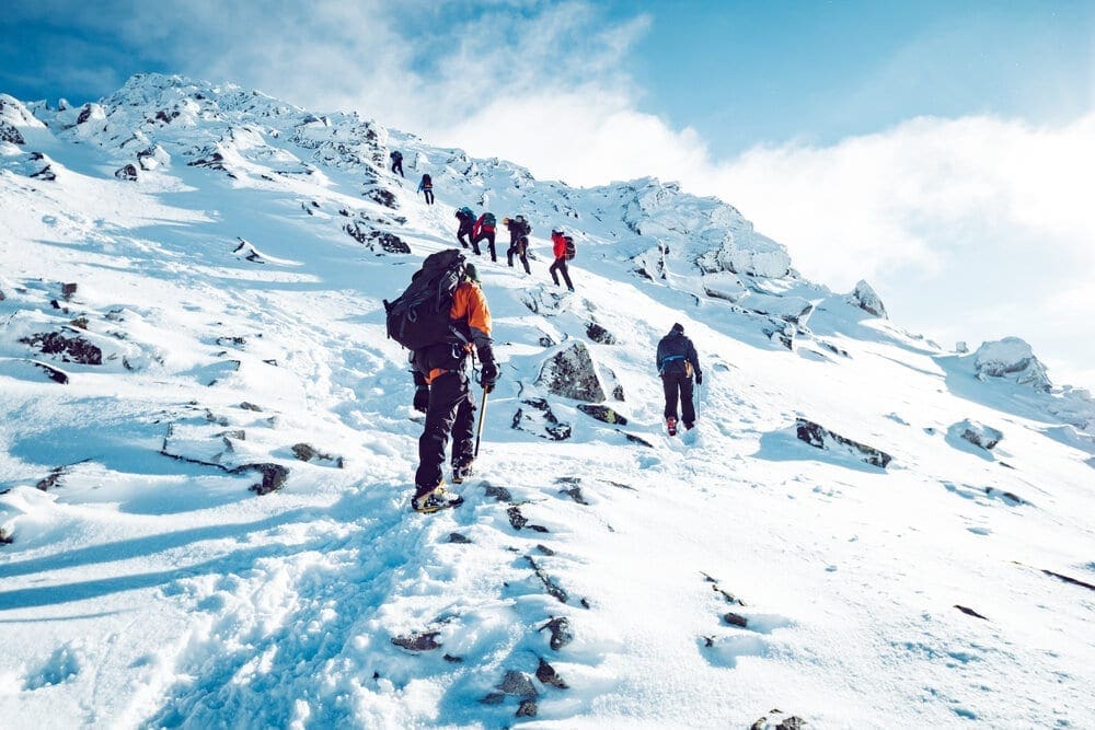 A group of climbers ascending a mountain in winter (Copy)