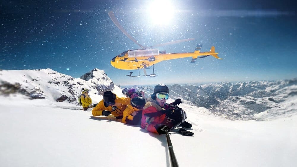 snowboarder were dropped by a helicopter while taking selfie