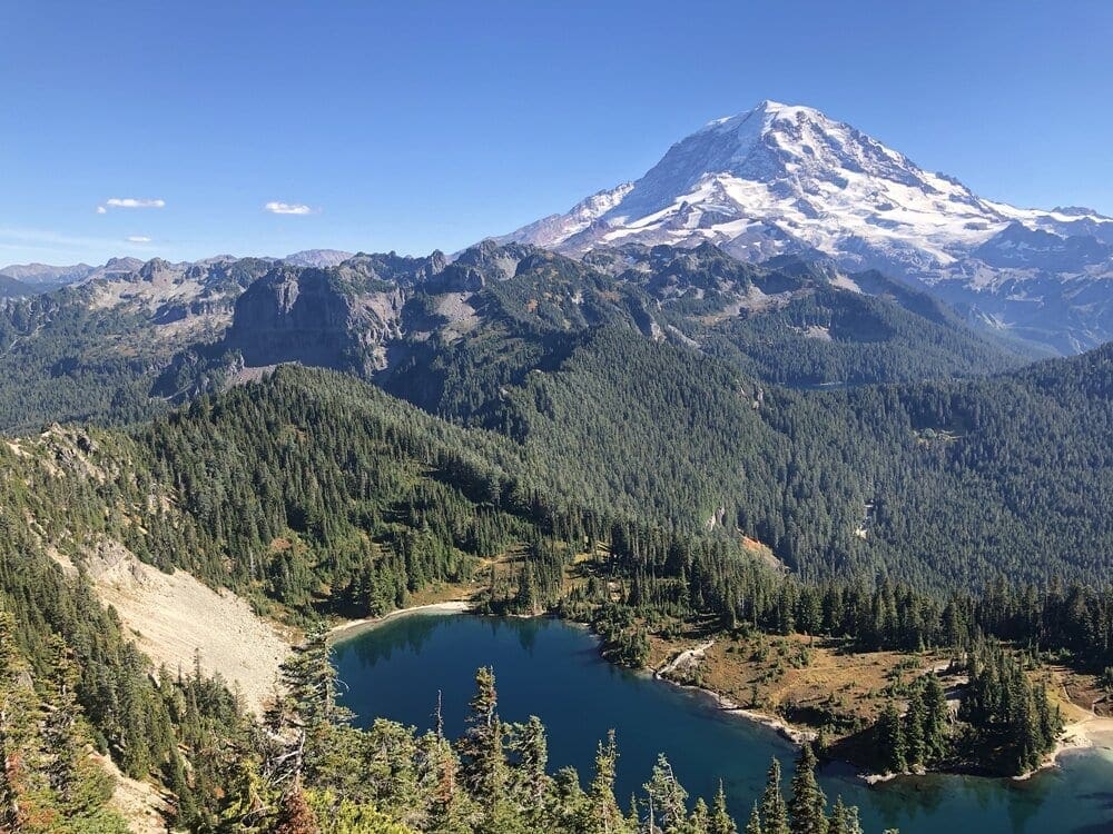 The. Tolmie Peak Trail has amazing views of Mount Rainier and the sapphire blue Eunice Lake.
