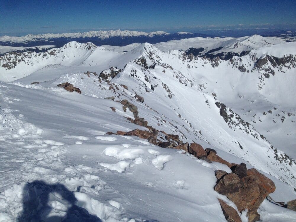 Photo 21: Summit ridge in full snow (May)