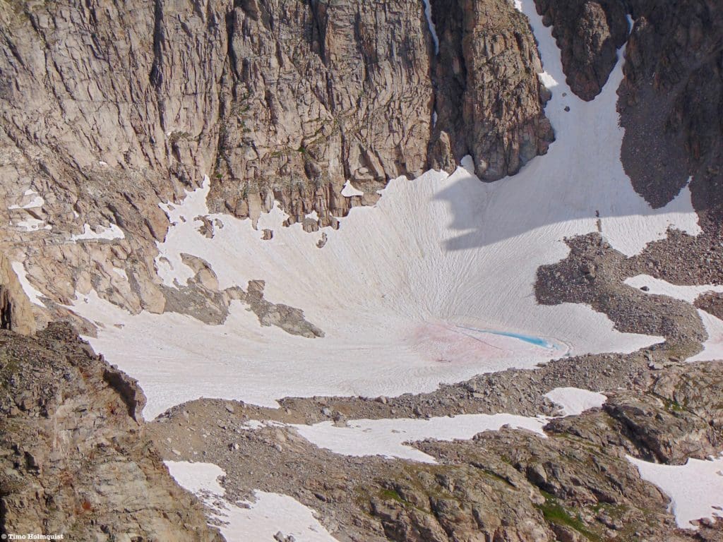 Zoomed in on the glacier with the tarn visible at its lower end.