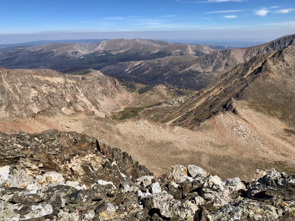 Looking north to the Comanche Peaks and the lower hills beyond. The sick-looking layer of particulates settling over the lower country is from rampant wildfires in California.
