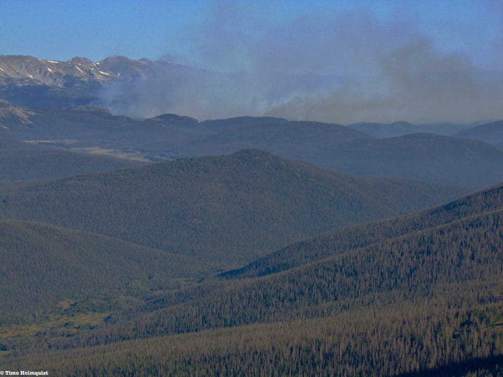 The Cameron peak fire raging to the north. Roughly a week after this hike, it would burn into the park, and the area would around the Desolations would close.
